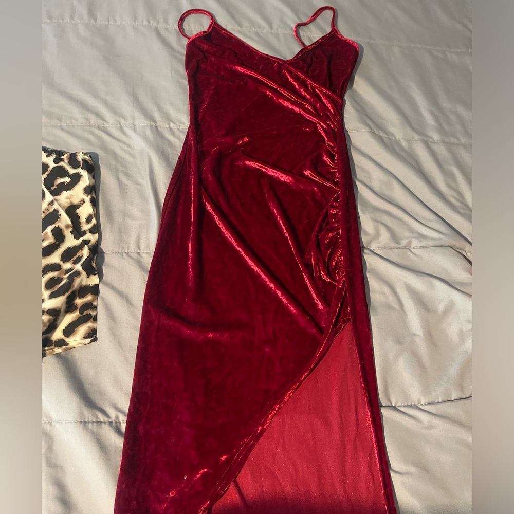 Burgundy velvet dress with a v neckline and high slit